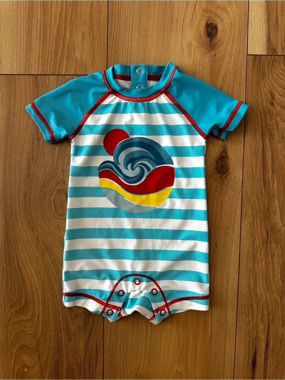 Turquoise Stripe Kids Swim Romper with Wave Graphic